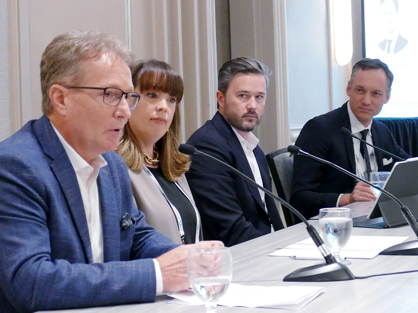 Speaking on the transmission panel were (from left): Robert Reinmuller, Hydro One; Beverly Nollert, IESO; Evan Yager, NextEra Energy Transmission, and John Vellone, BLG.