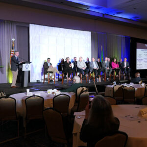 NARUC Executive Director Tony Clark (left) leads a panel discussion on the GEAR Task Force on Nov. 11 at NARUC's annual meeting in Seattle. NARUC Executive Director Tony Clark (left) leads a panel discussion on the GEAR Task Force on Nov. 11 at NARUC's annual meeting in Seattle.