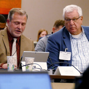 SPP CEO Lanny Nickell delivers the president's report as Minnesota's John Tuma listens. SPP CEO Lanny Nickell delivers the president's report as Minnesota's John Tuma listens.