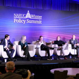 A panel at NARUC with (from left) Virginia State Corporation Commissioner Jehmal Hudson, Nick Elliot of the White House, Google's Briana Kobor, Indiana Utility Regulatory Commissioner David Veleta, Arizona Public Service's Jose Esparza, Smart Electric Power Alliance's Lakin Garth and North Carolina Utilities Commission Public Staff Executive Director Christopher Ayers A panel at NARUC with (from left) Virginia State Corporation Commissioner Jehmal Hudson, Nick Elliot of the White House, Google's Briana Kobor, Indiana Utility Regulatory Commissioner David Veleta, Arizona Public Service's Jose Esparza, Smart Electric Power Alliance's Lakin Garth and North Carolina Utilities Commission Public Staff Executive Director Christopher Ayers