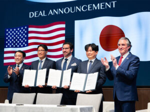 U.S. Interior Secretary Doug Burgum, right, applauds a deal signed during the Indo-Pacific Energy Security Summit. U.S. Interior Secretary Doug Burgum, right, applauds a deal signed during the Indo-Pacific Energy Security Summit.