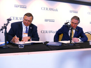 TotalEnergies CEO Patrick Pouyanné (left), Interior Secretary Doug Burgum during a signing ceremony on the sidelines of CERAWeek by S&P Global that gives the French company $928 million to give up offshore wind leases and invest in U.S. fossil fuels. TotalEnergies CEO Patrick Pouyanné (left), Interior Secretary Doug Burgum during a signing ceremony on the sidelines of CERAWeek by S&P Global that gives the French company $928 million to give up offshore wind leases and invest in U.S. fossil fuels.