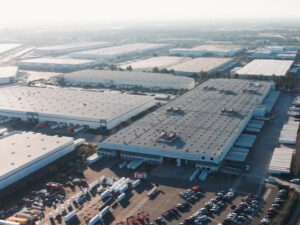 The Tesla Megafactory in Lathrop, Calif., is shown. Tesla is part of a new industry consortium seeking to unlock underused grid capacity. The Tesla Megafactory in Lathrop, Calif., is shown. Tesla is part of a new industry consortium seeking to unlock underused grid capacity.